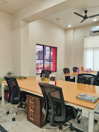 Modern coworking space in Vaishali Nagar, Jaipur with furnished setup, ergonomic chairs, whiteboard, AC, and inspiring environment.