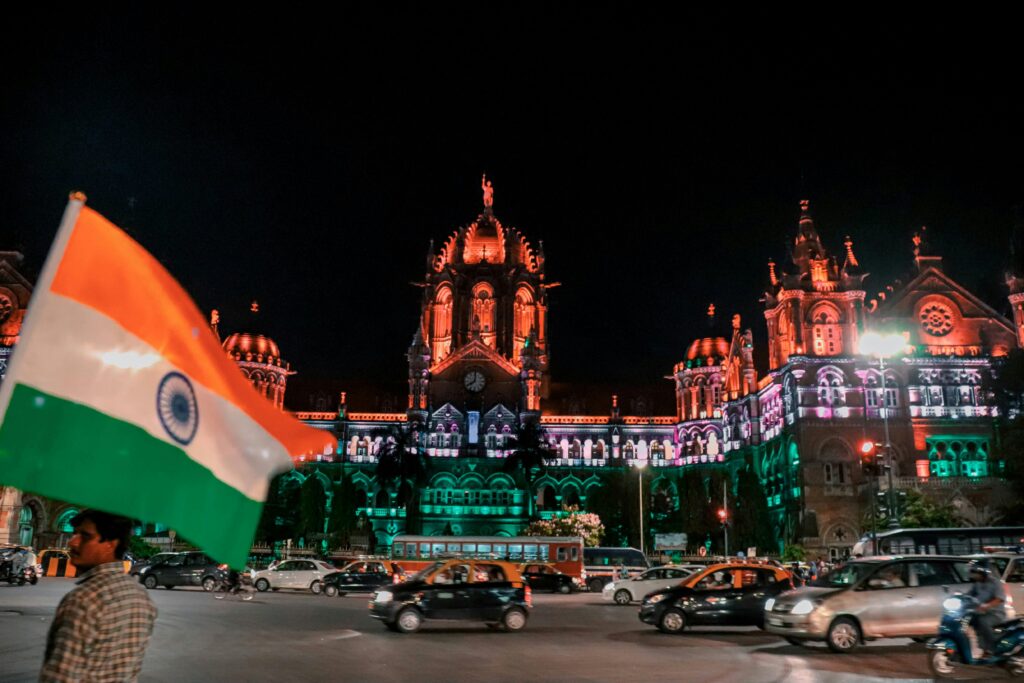 Historic Mumbai railway station adorned in Indian flag colors, representing virtual office solutions for GST registration